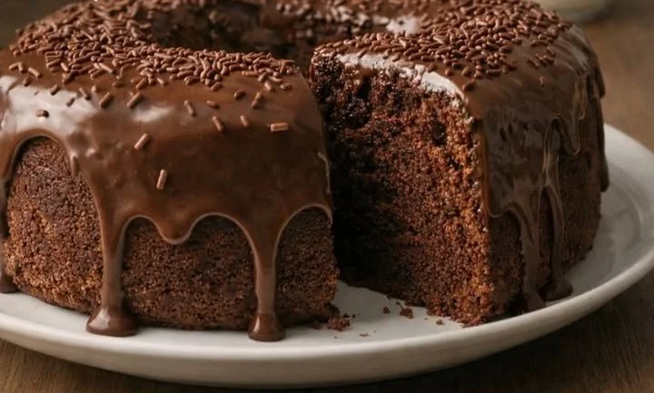 Delicious condensed milk chocolate cake garnished with chocolate frosting.