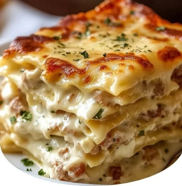 Delicious Crack Chicken Lasagna served in a baking dish with melted cheese