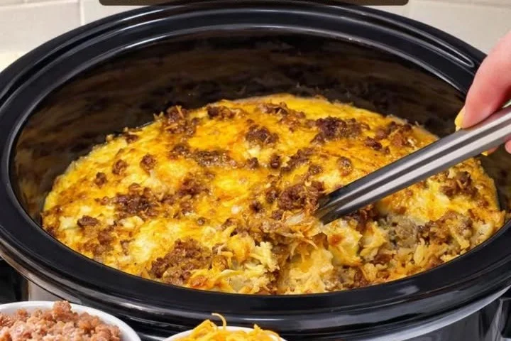 A tasty Crockpot Overnight Breakfast Casserole ready to serve.