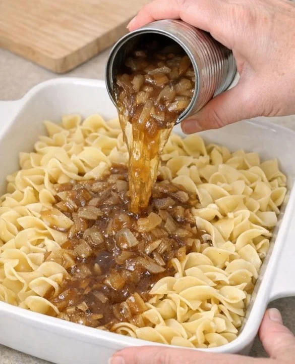 Delicious French Onion Soup Casserole with melted cheese and crispy bread topping.