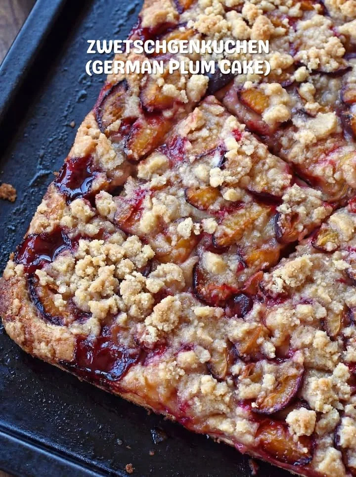 Delicious homemade German Plum Cake topped with fresh plums and a crumbly crust