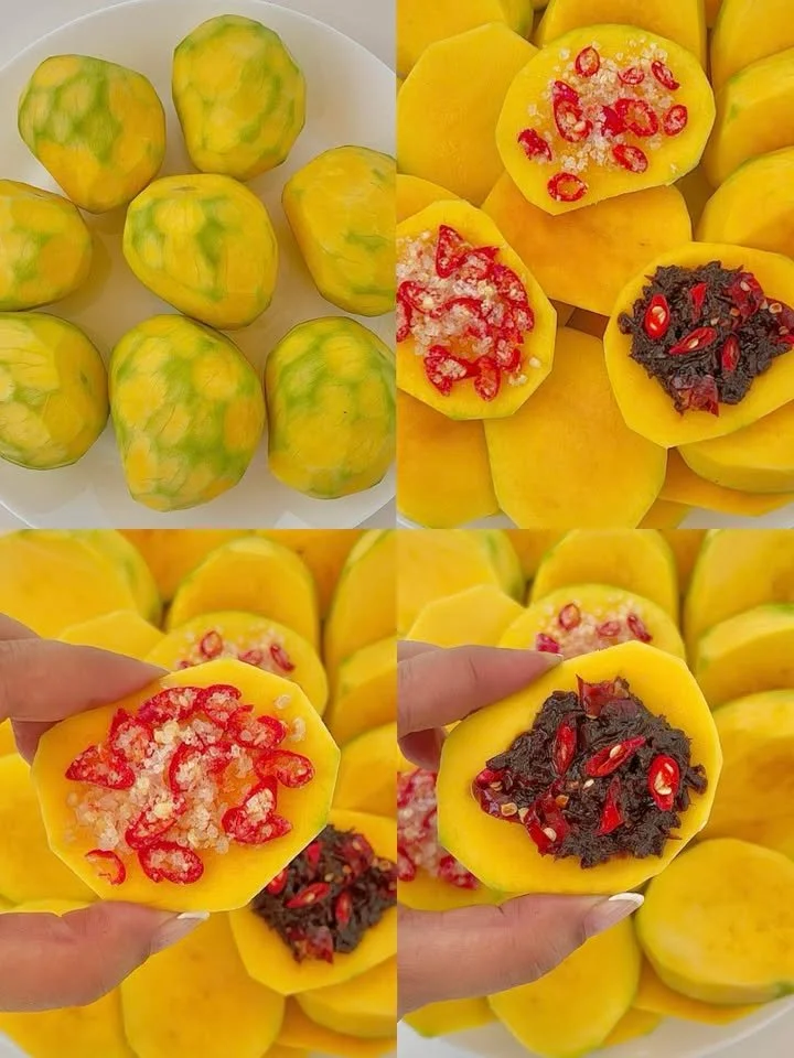 Mango topped with shrimp paste and chili for a flavorful dish.