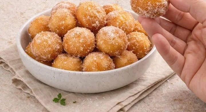 Delicious mini donut bites arranged on a platter for serving