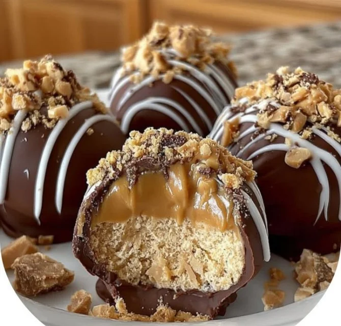 No-bake peanut butter cheesecake balls on a white plate
