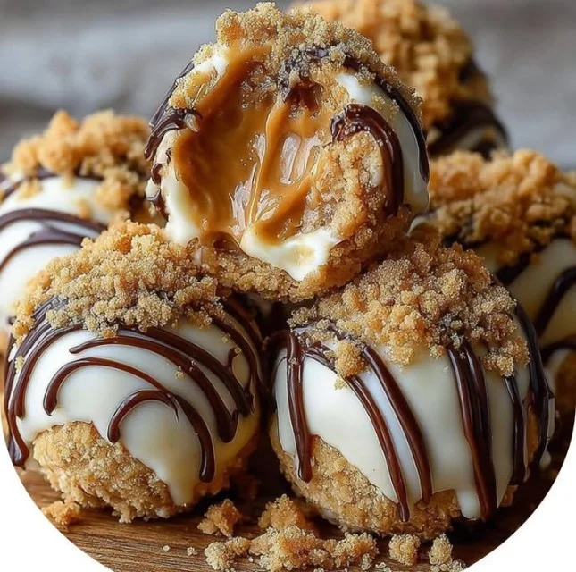 Delicious no-bake peanut butter cheesecake balls topped with chocolate drizzle