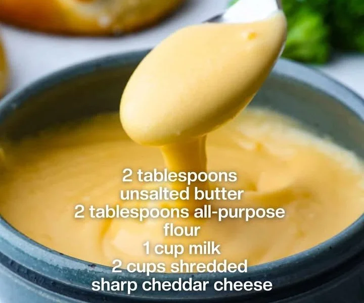 A bowl of creamy, clump-free cheese sauce ready in under 10 minutes.