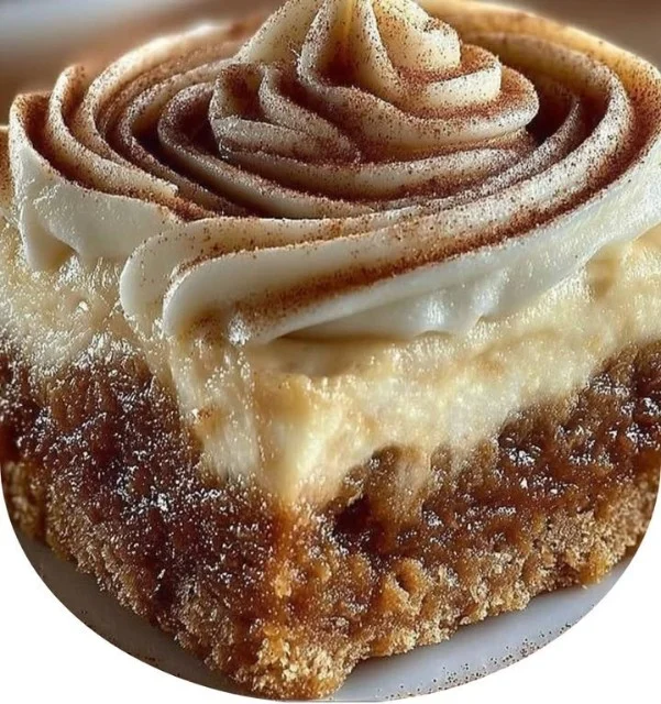 Delicious pumpkin spice gooey cake with cream cheese frosting