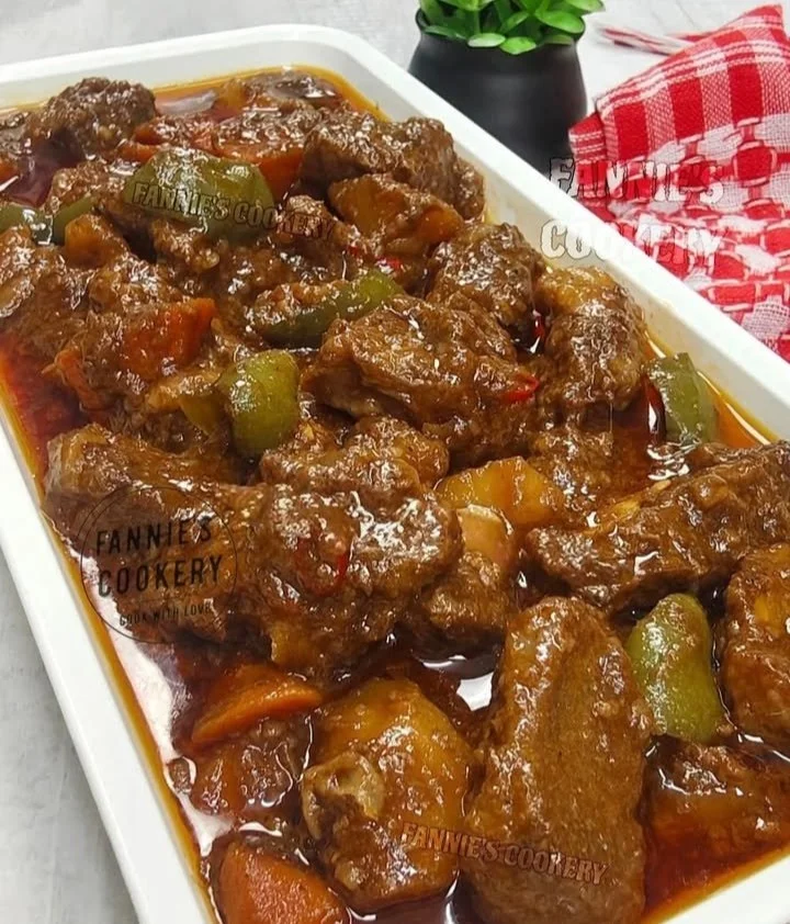 Simple Beef Mechado with tender beef and rich sauce served in a bowl