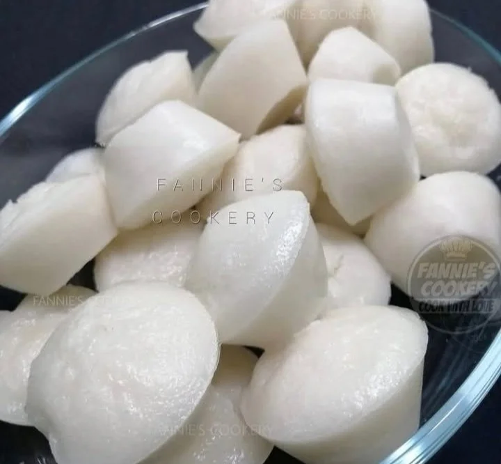 Plate of delicious homemade steamed rice cake topped with fresh ingredients
