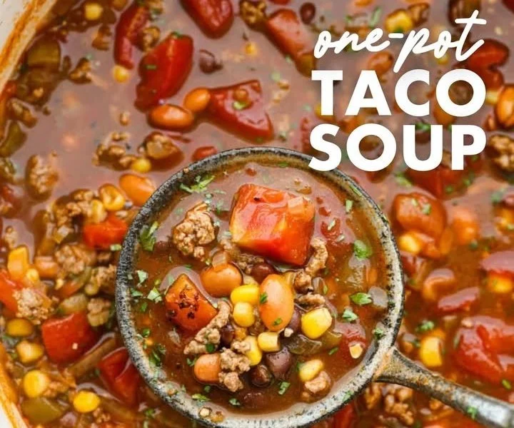 A bowl of delicious homemade Taco Soup garnished with cilantro and avocado.