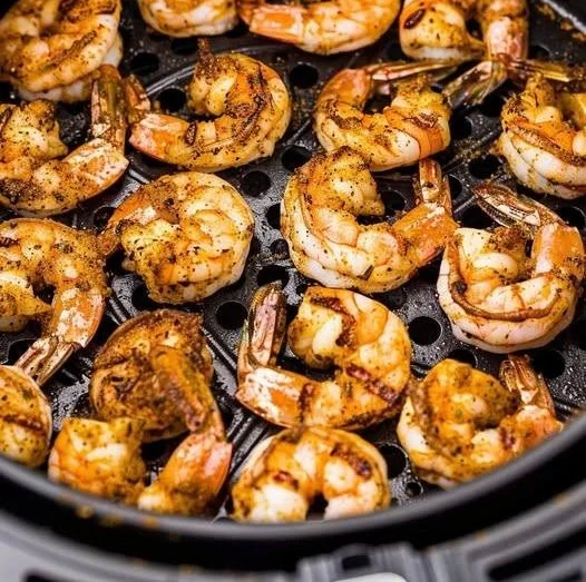 Crispy air fried seasoned shrimp served with dipping sauce