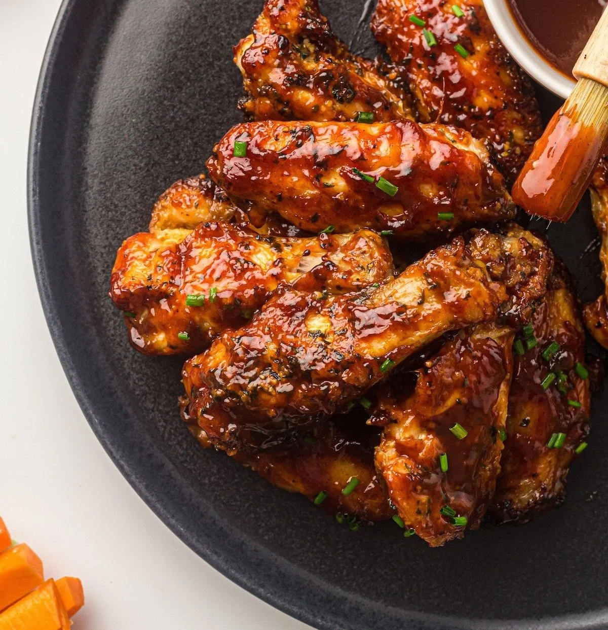 Delicious Air Fryer BBQ Chicken Wings served with dipping sauce