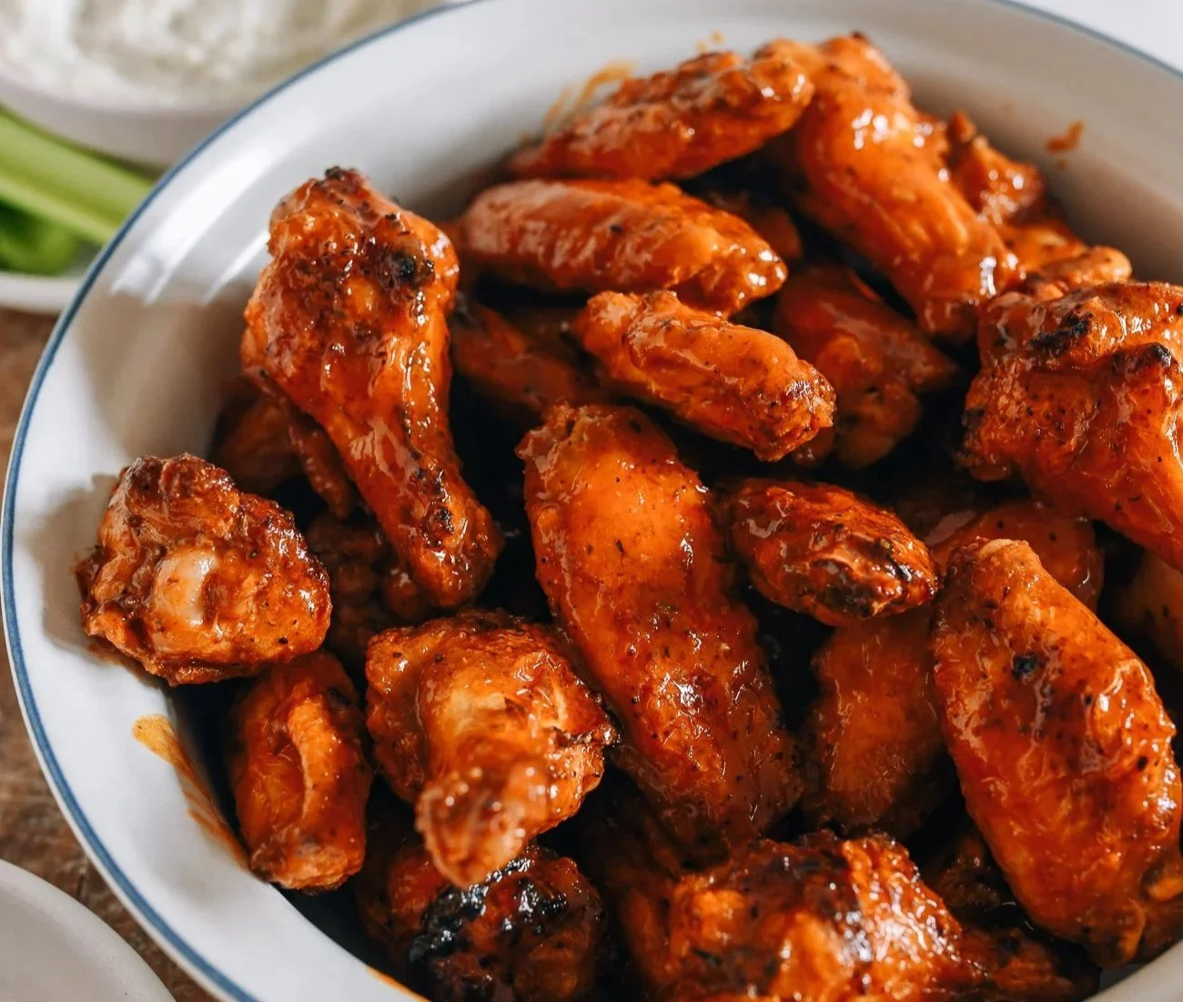 Crispy air fryer buffalo wings ready to serve with dipping sauce