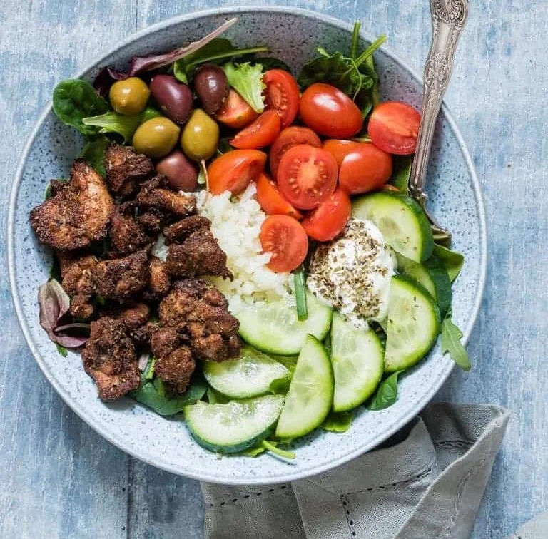 Air Fryer Chicken Shawarma Bowl with fresh vegetables and spices