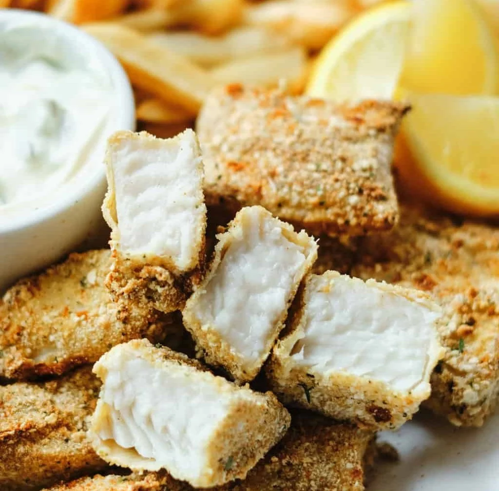 Crispy air fryer fish sticks served with dipping sauce
