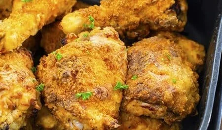 Delicious air fryer fried chicken plated with a golden crispy crust
