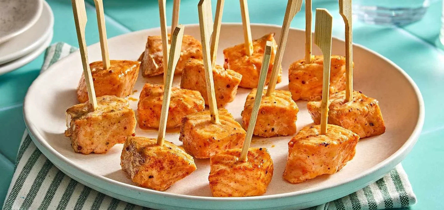 Delicious air fryer honey mustard salmon bites served on a plate