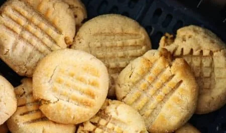 Delicious air fryer peanut butter cookies displayed on a plate.