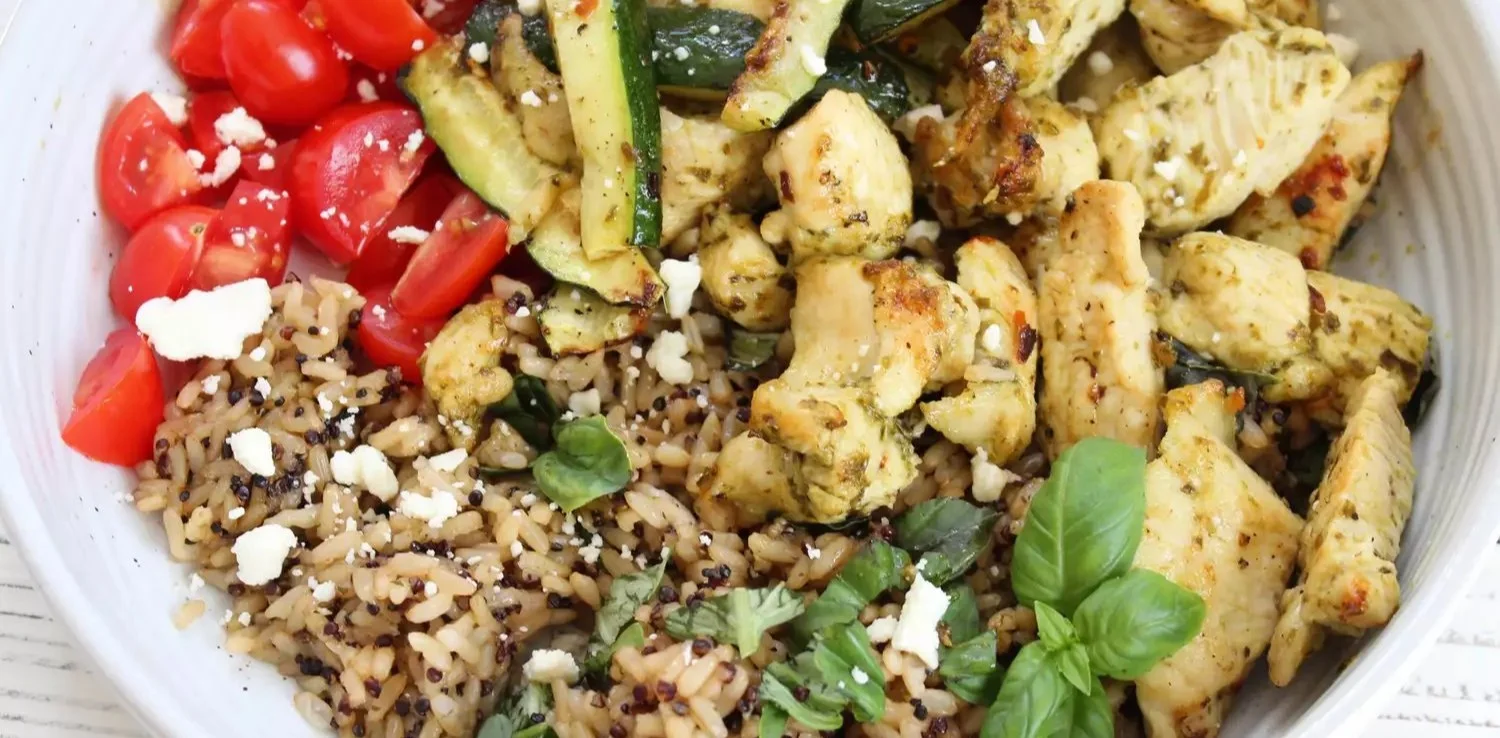 Air Fryer Pesto Chicken Quinoa Bowl with fresh ingredients and vibrant colors.