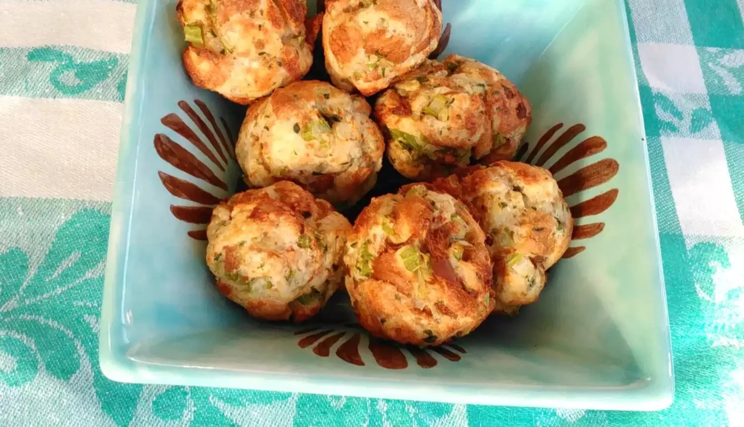 Crispy air fryer stuffing balls ready to serve on a festive table.