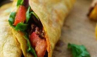 Crispy Air Fryer Tacos served with fresh toppings and salsa