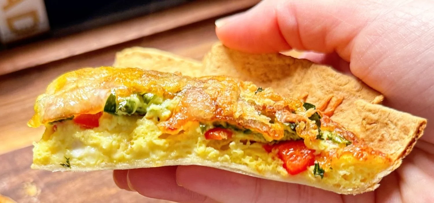 Delicious Air Fryer Tortilla Quiche served with fresh herbs and toppings