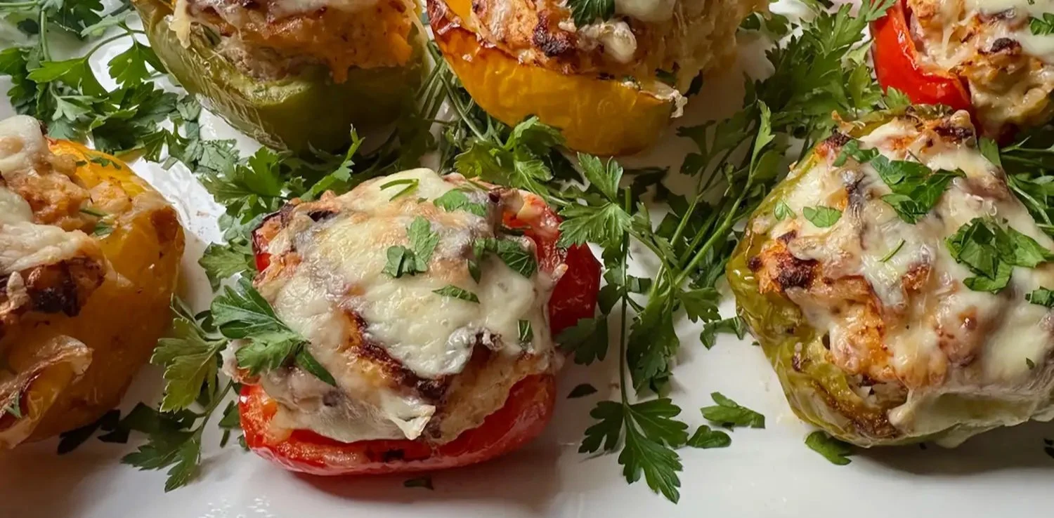 Air Fryer Turkey Stuffed Peppers served on a plate with fresh herbs