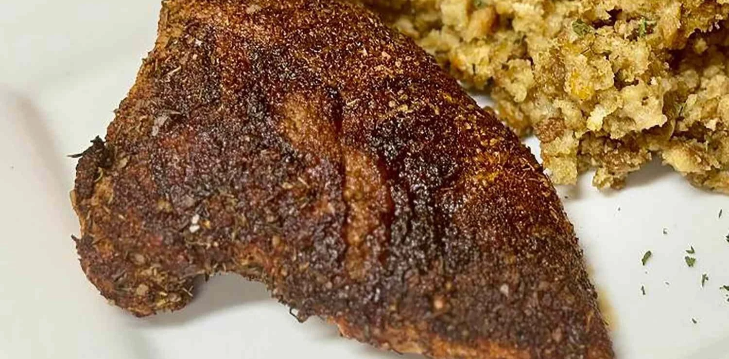 Air fryer turkey tenderloin cooked to perfection alongside veggies.