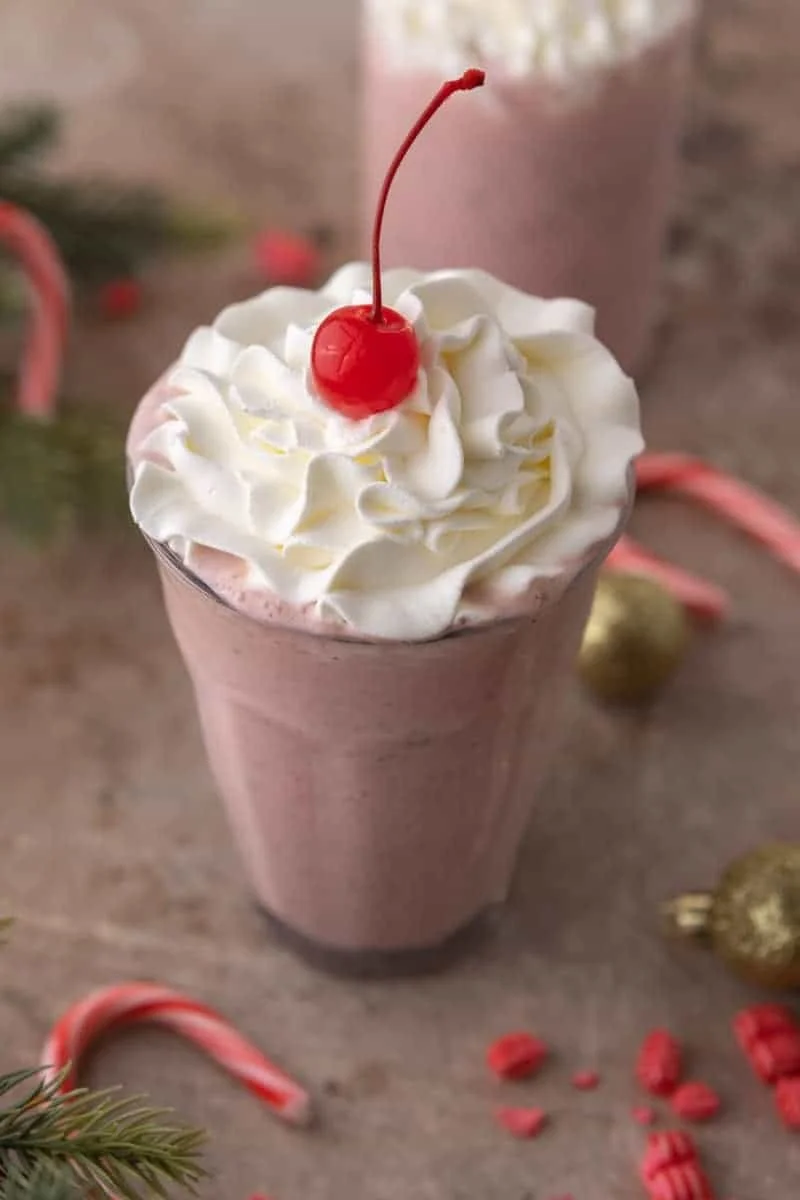 Chick Fil A Peppermint Milkshake served in a festive cup with crushed peppermint.