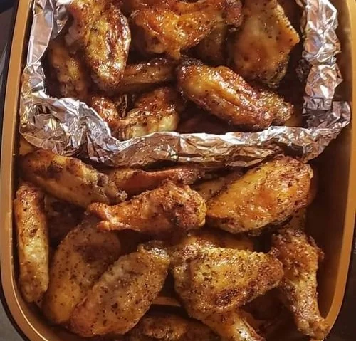 Crispy air fryer chicken wings served with dipping sauce