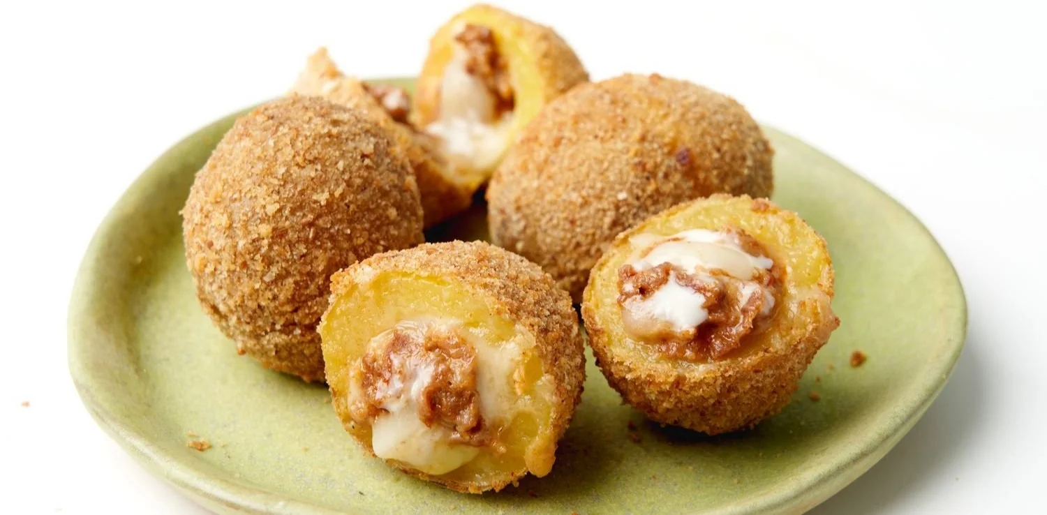Delicious Chorizo Cheese Potato Bombs ready to serve as a tasty appetizer.