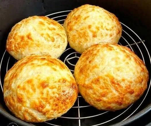Freshly baked easy homemade cheese biscuits on a cooling rack