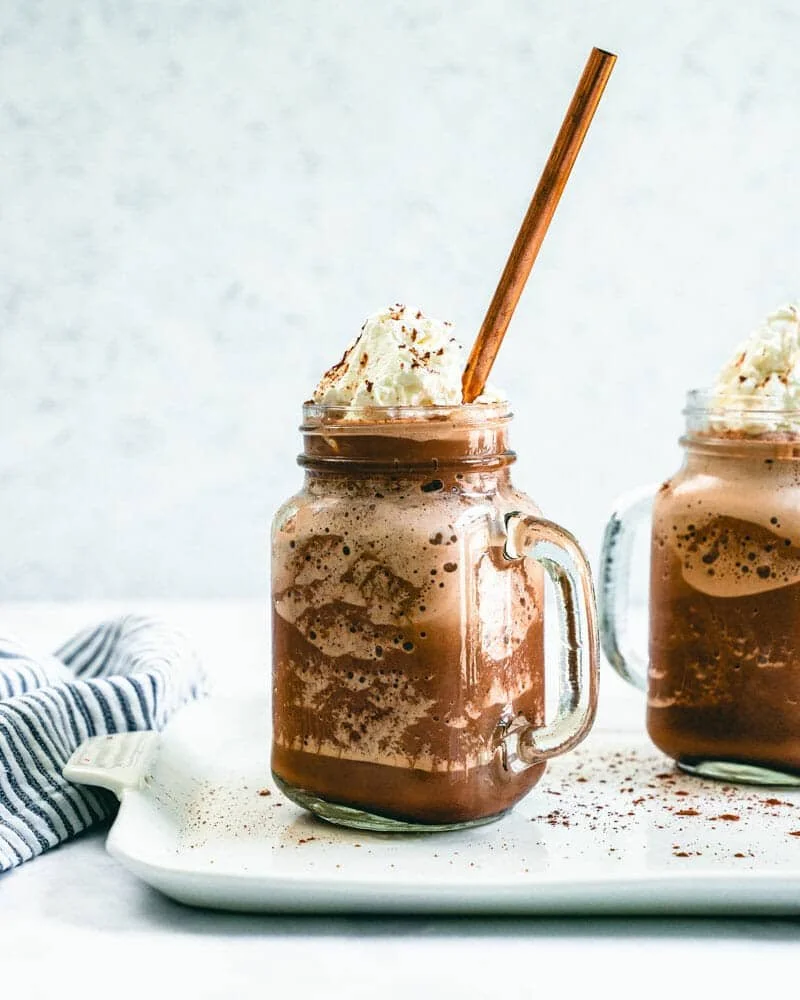 Delicious frozen hot chocolate topped with whipped cream and chocolate shavings