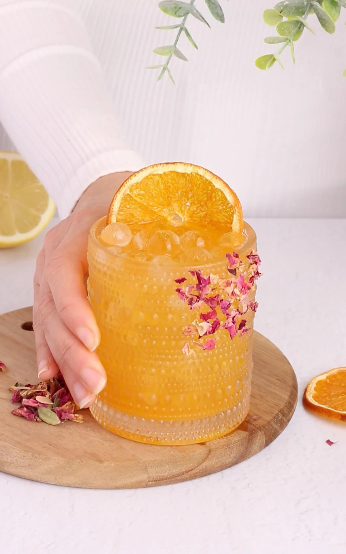 Colorful healthy immune boost mocktail with fresh fruits and herbs