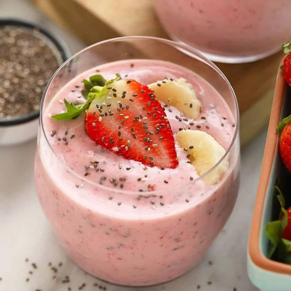 A colorful smoothie made with fruits and vegetables in a glass