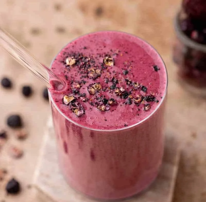 A delicious mixed berry smoothie made with fresh fruits and yogurt.