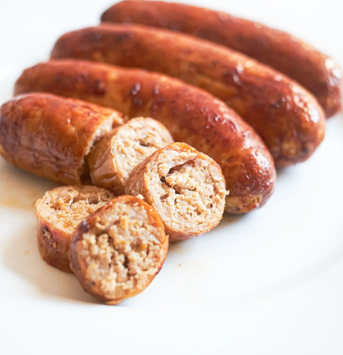 Air-fried Italian sausage served with vegetables on a plate