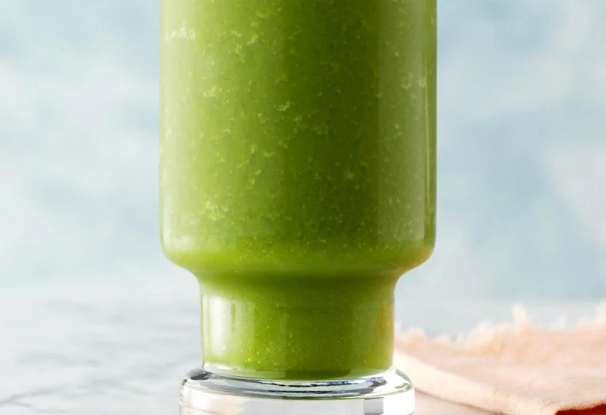 Healthy Kale Ginger Smoothie in a glass with a vibrant green color