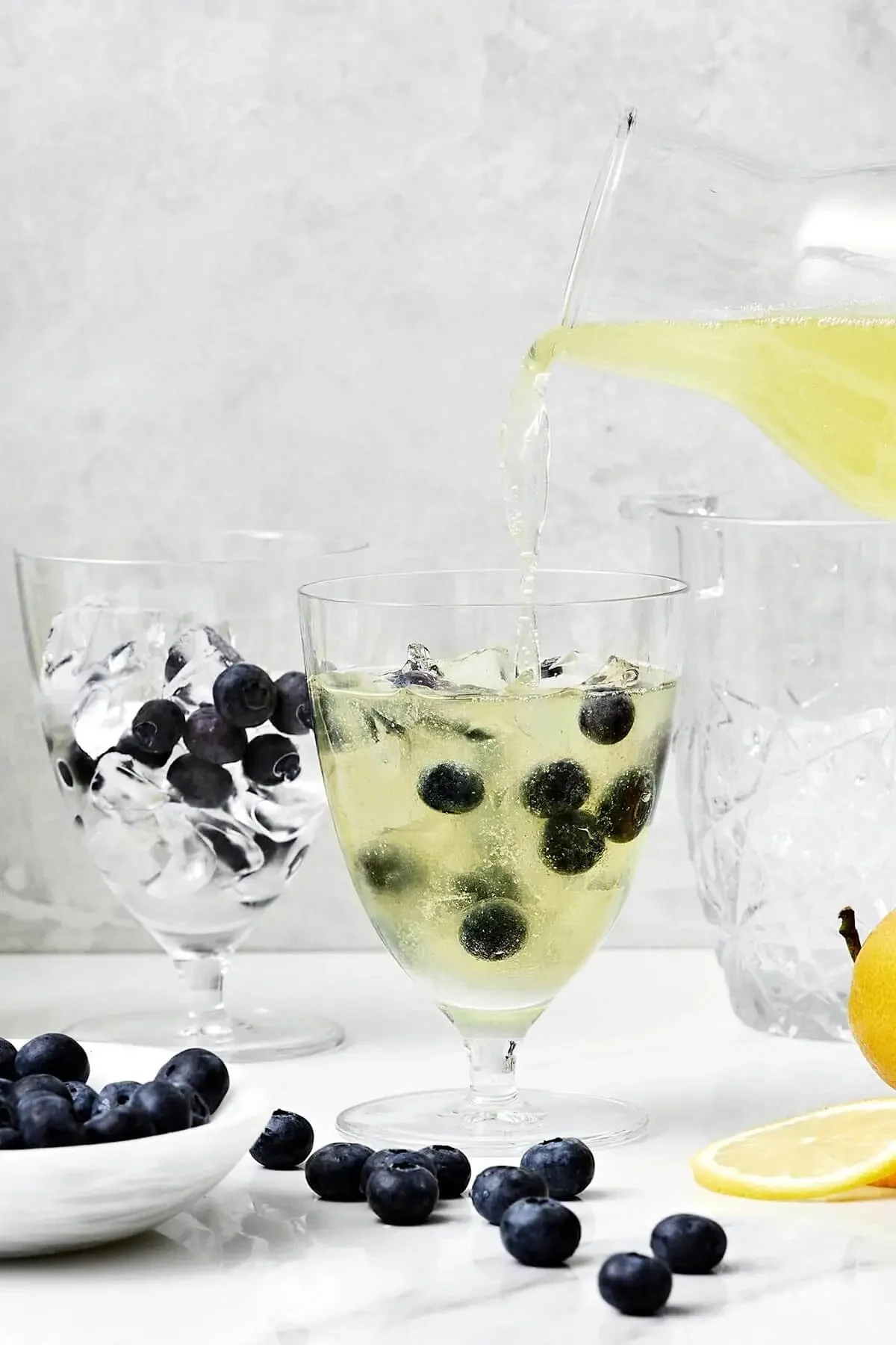 Bottle of Limoncello Prosecco served in a glass with lemon slices