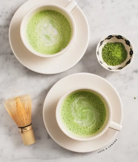 A delicious cup of Matcha Latte topped with a frothy swirl