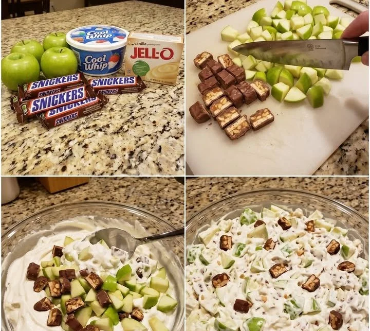A bowl of Midwest Snickers Apple Salad with apples, Snickers, and whipped cream.