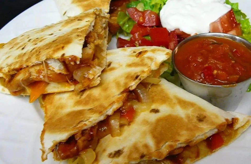 Delicious Texas Chicken Quesadillas with chicken, cheese, and spices