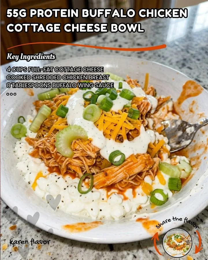 Buffalo Chicken Cottage Cheese Bowl topped with celery and ranch dressing.