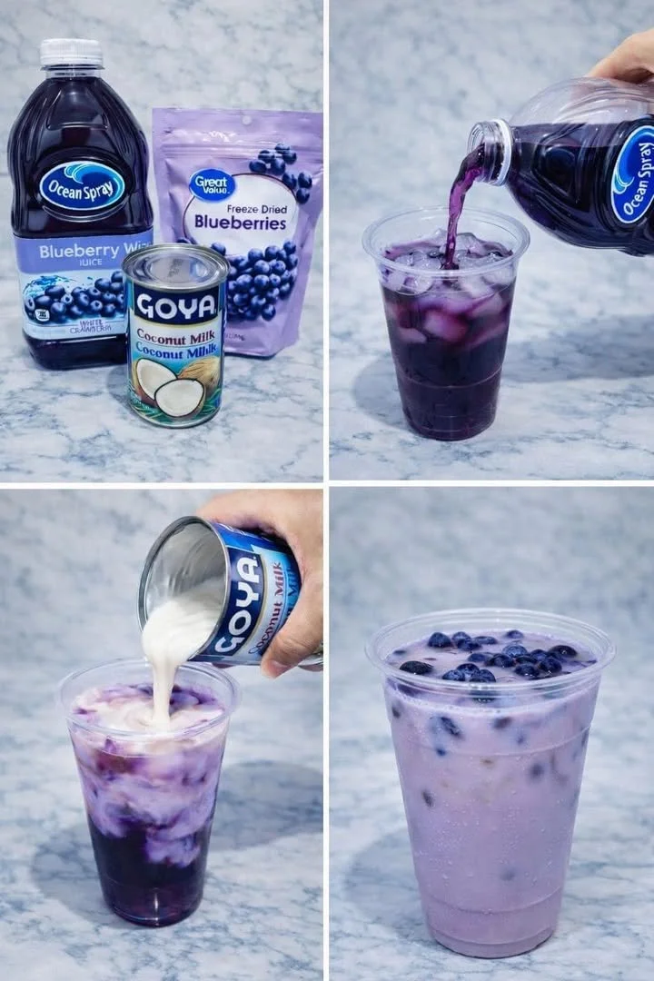 Blueberry Coconut Cream Refresher in a glass with berries and coconut garnish