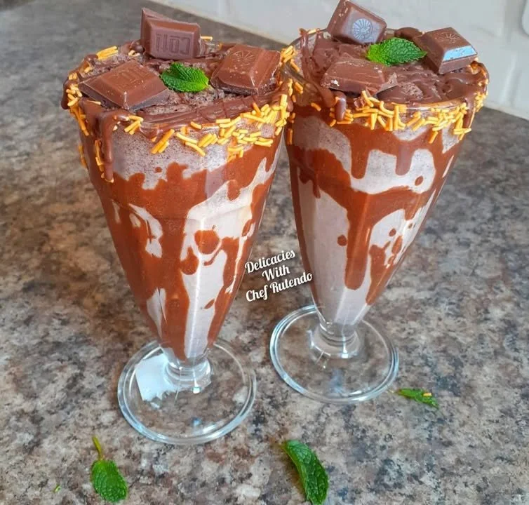 Delicious Chocolate Oreo Milkshake topped with whipped cream and crushed Oreos