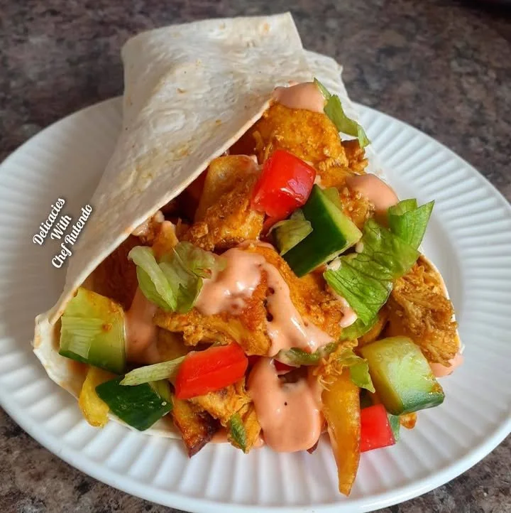 Loaded chicken wraps filled with fresh ingredients and sauces