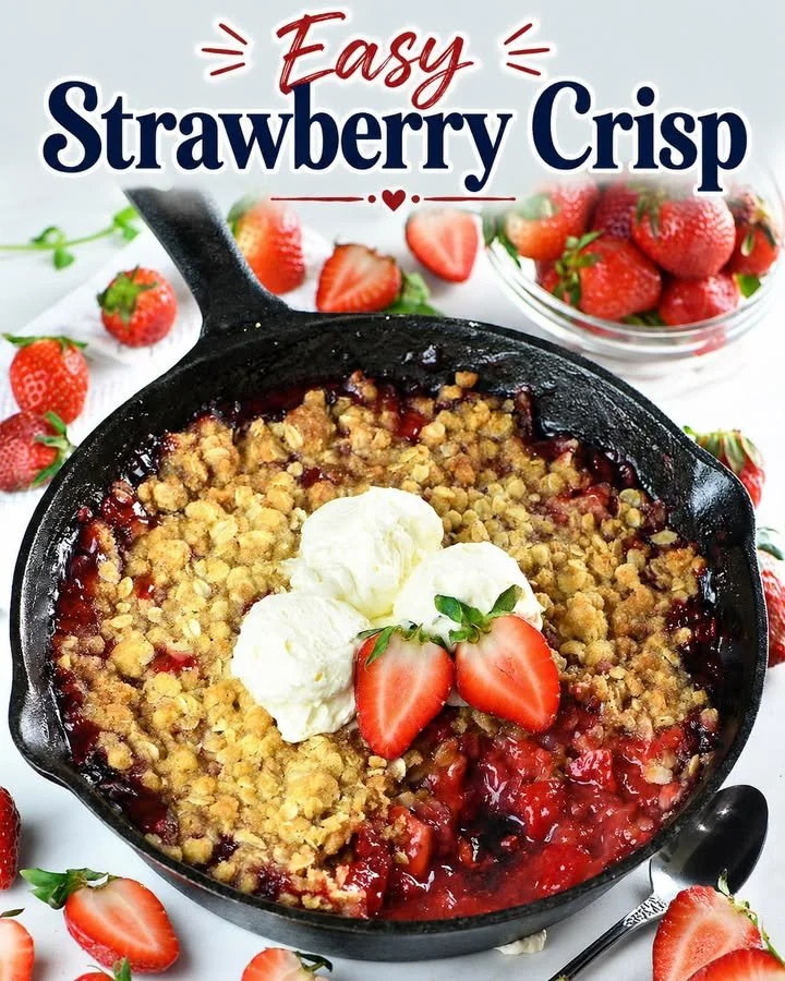 Delicious bowl of homemade Strawberry Crisp with fresh strawberries and crumbly topping.