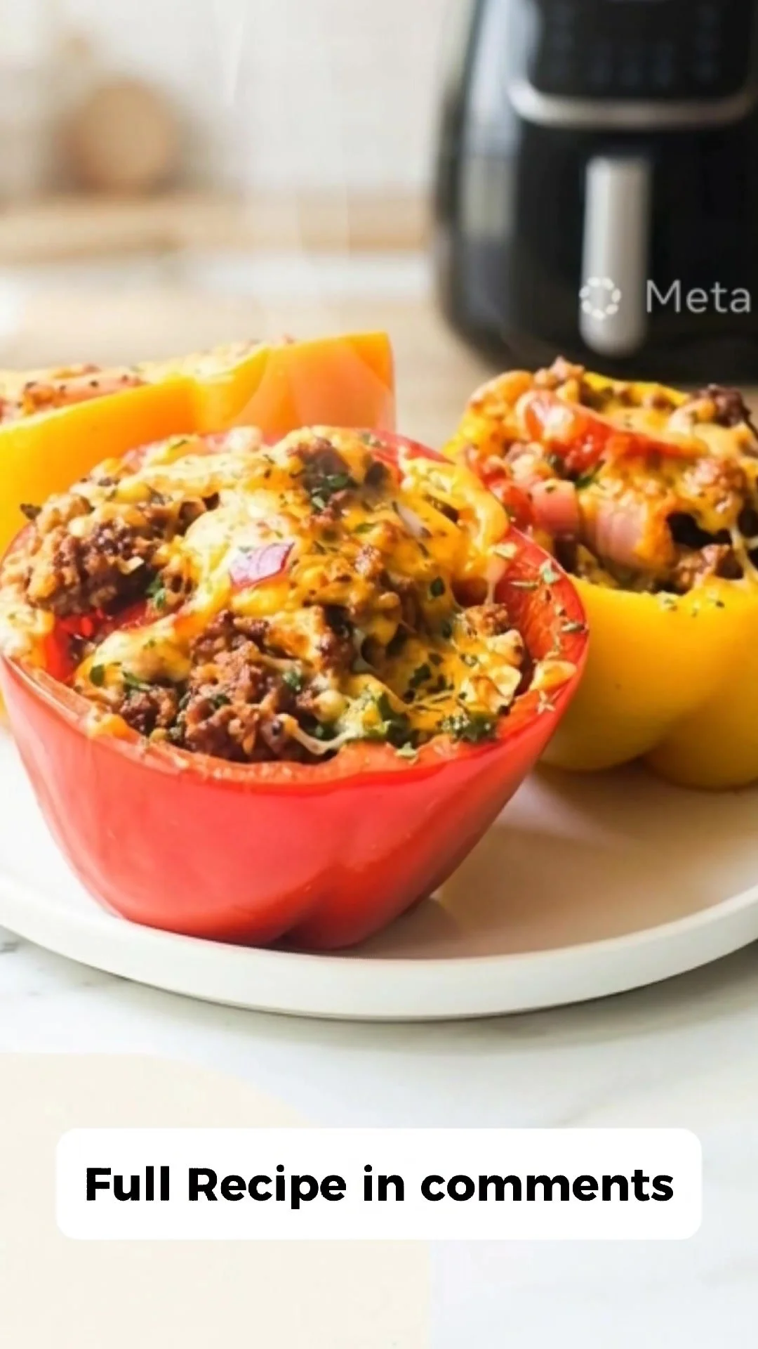 Cheesy stuffed peppers fresh out of the oven, garnished and ready to serve.